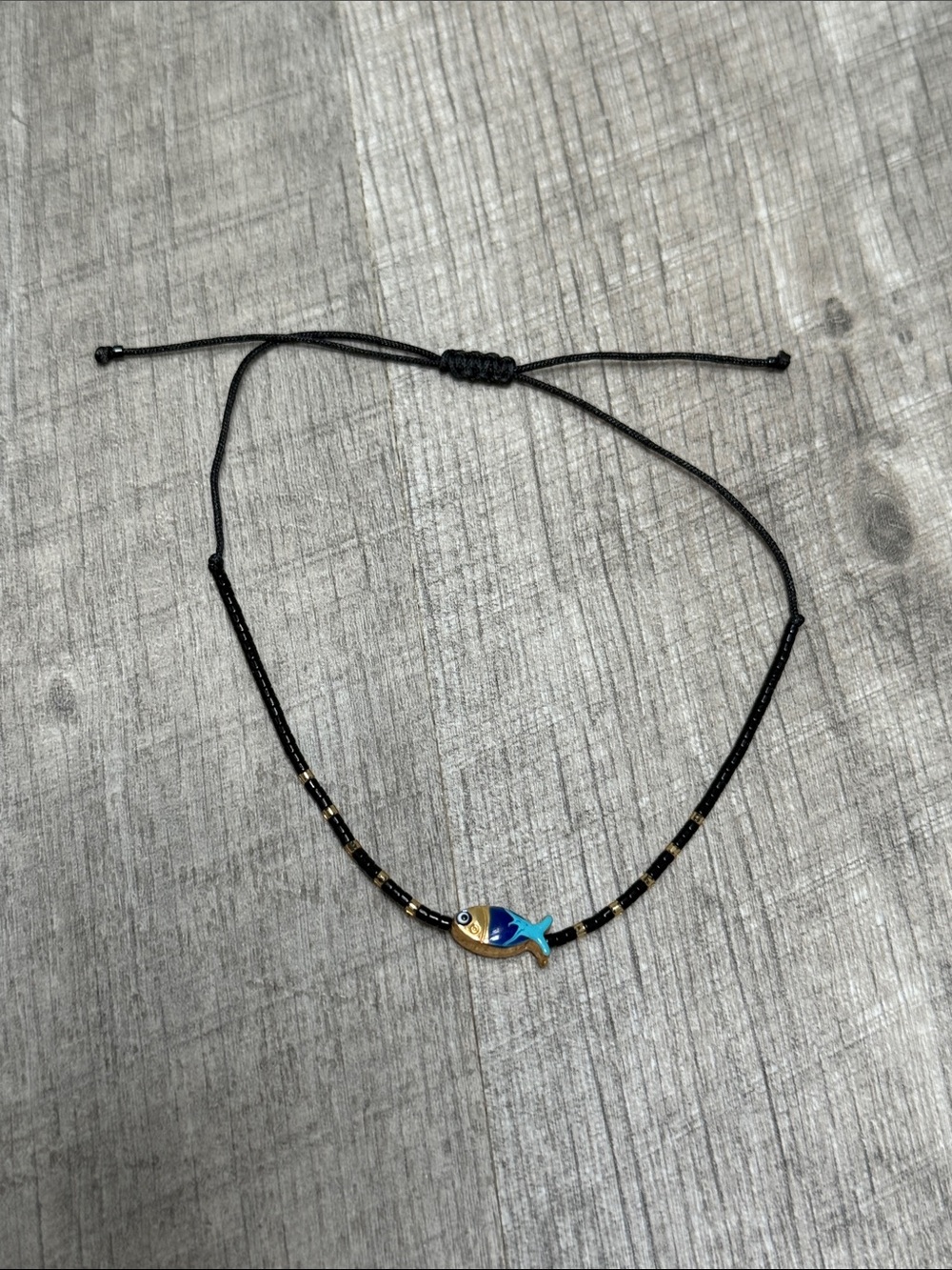 Adjustable Black Cord Bracelet with Blue Enamel Fish Charm
